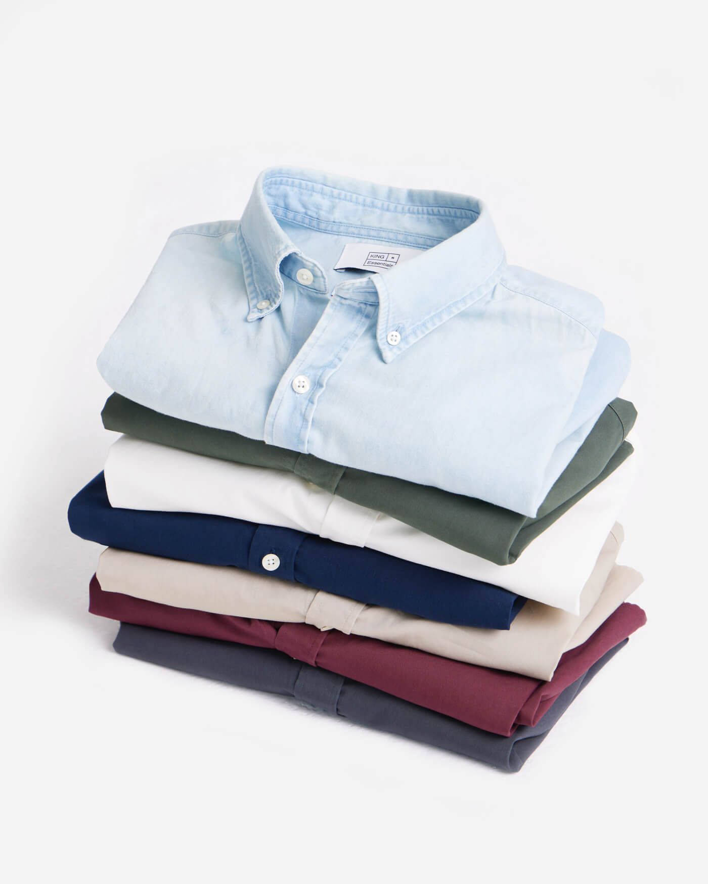 KING Essentials | Stack of King Shirts